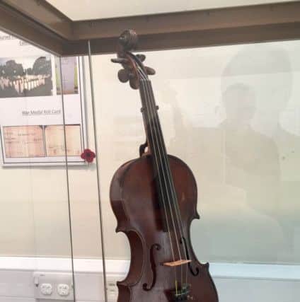 The Robert Dunsire violin on display at Kirkcaldy Galleries.