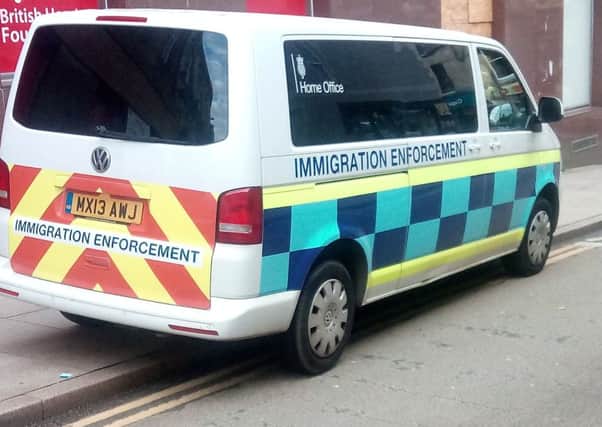 Immigration vans in the area. Picture: JP