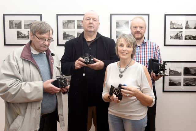 Photographic Society  members Stewart Russell, Stefan Czemerys, chairman Cathy Davis and Martin Watt. (Pic FPA)