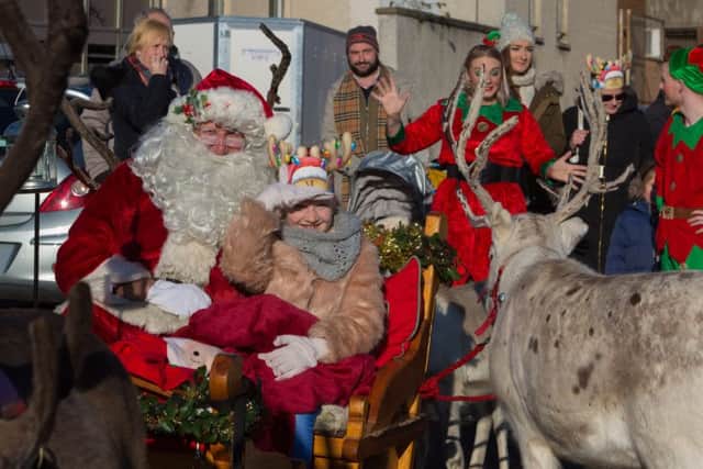 Santa will settle into his new grotto after the parade on Sunday.