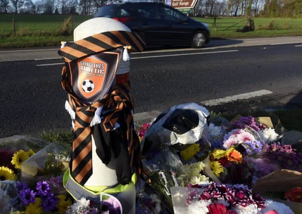 Floral tributes at the scene of the crash (Pic: Fife Photo Agency)