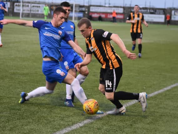 Liam Watt works his way down the line for the Fifers. Pic by Kenny Mackay.