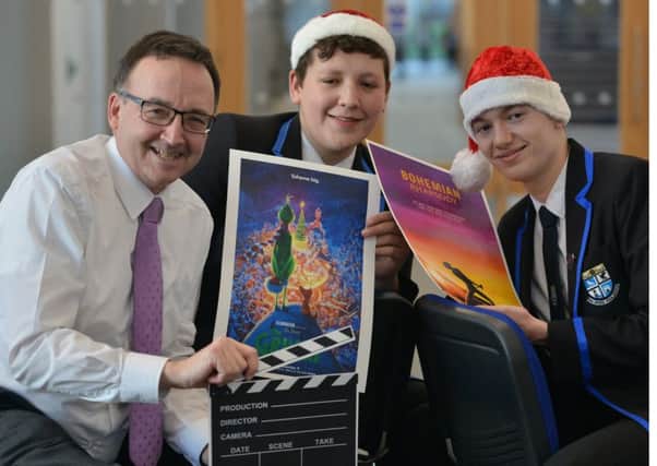 Rector Adrian Watt, with Pupils Sam Carson and Lochlan Stephens. Picture: George McLuskie
