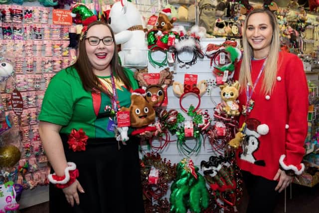 Staff got in the festive spirit as free entertainment and activities took place in the Mercat.