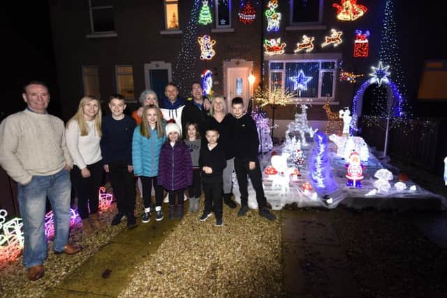 Piper Crescent residents have agreed its seasonal sparkle should benefit others this year. Pic: Fife Photo Agency