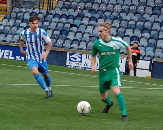 Garry Thomson in possession for Thornton Hibs against Renfrew in the Scottish Junior Cup