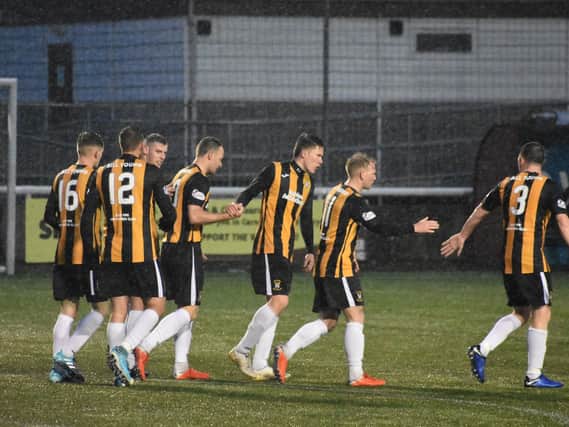 The East Fife players celebrate Kevin Smith's opener. Pic by Kenny Mackay.