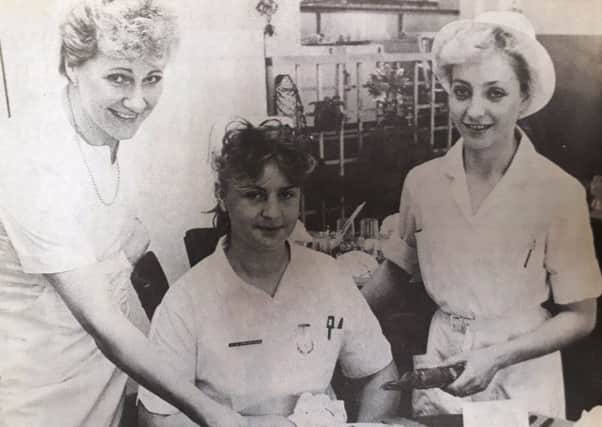 At the Victoria Hospital, Christmas 1987 are dining room supervispr Mary Haig, pupil nurse Tracy Drysedale and dining room charge hand Evelyn Hall.