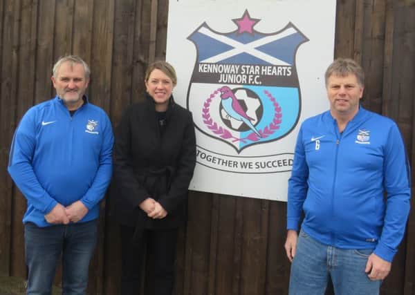 Left to right: Brian Collins, coach, Jenny Gilruth MSP, Brian Davidson, treasurer Kennoway Star Hearts JFC.
