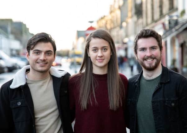 Lewis, left, with friends Ines Methven and Matthew McAnaw.