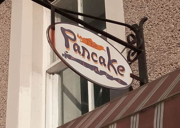 The well known Pancake Place sign in Kirk Wynd