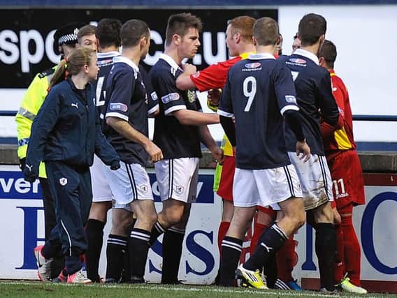 The touchline incident that resulted in Raith defender Dougie Hill being red carded. Pic: Neil Doig