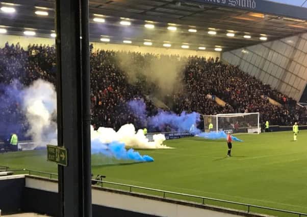 Flares thrown on to the pitch at Stark's Park (Pic: Fife Free Press)
