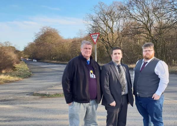 Councillors Davidson, Graham and Smart on the Standing Stane.