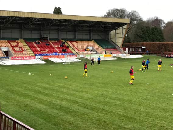 Rovers warm-up ahead of the match at Glebe Park.