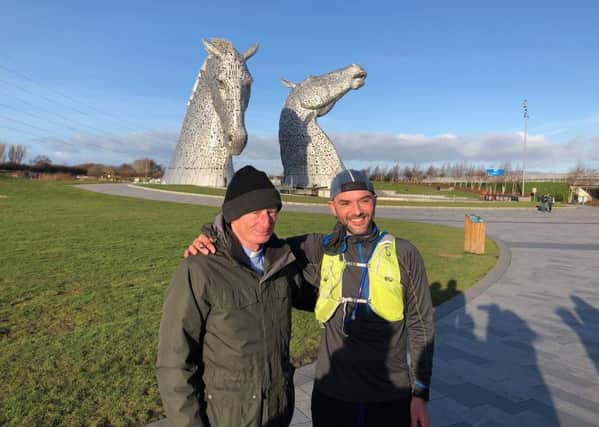 Rev Andrew Sarle (left), from Bainsford Parish Church, with Dr Mark Calder during his first pilgrimage, which took him to the Kelpies in Falkirk.