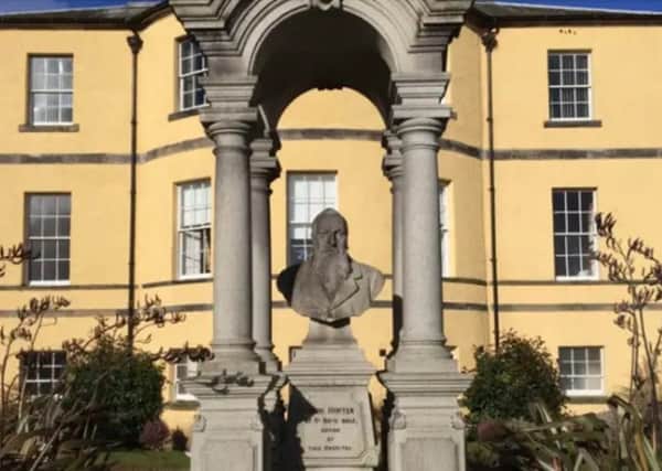 The bust of John Hunter at the former entrance to the hospital which bore his name