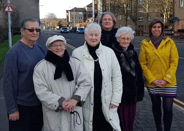 Margaret Nisbet (front left) has started up a petition to introduce speed calming on Nicol Street. She is pictured with residents from Sandford Gate, Councillor Zoe Hisbent and David Torrance MSP