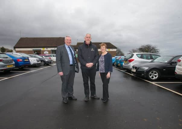 Scoonie Golf Course car park - from left  Cllr Ken Caldwell, Alistair MacGregor (Golf Services Manager for Fife Golf Trust) and Cllr Judy Hamilton.
