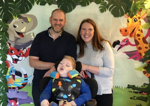 Defying the odds..Leo celebrating his third birthday with his proud parents Andrew and Gill White from St Andrews.