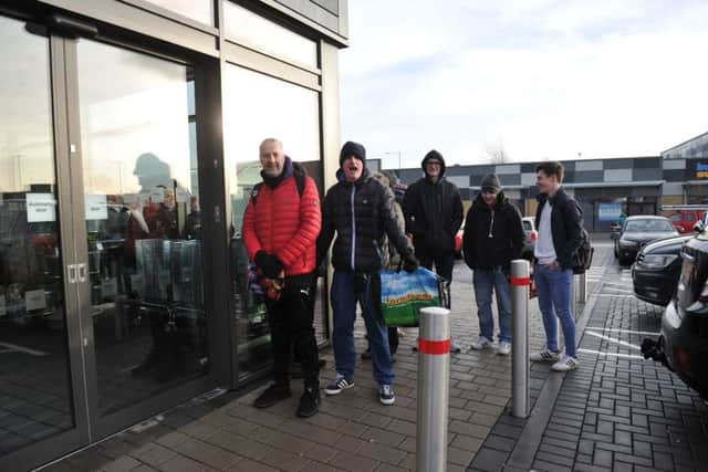 The first customers wait for the doors to open at the M&S Foodhall in Glenrothes. Pic: George McLuskie.