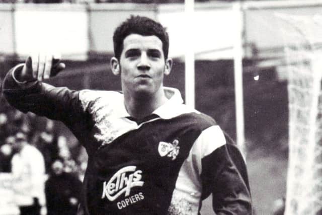 Scored 24 times in 115 games for Raith including the opener in the 1994 Coca-Cola Cup final. Moved to Millwall before joining Hibs in 1997,  making 73 appearances and scoring 23 goals, suffering relegation then winning promotion.