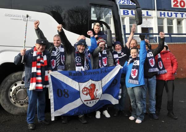 Raith have sold nine supporters buses for the trip to Hibs on Saturday.Group of supporters posing outside Bay Travel bus with player Iain Davidson. Pic: George McLuskie