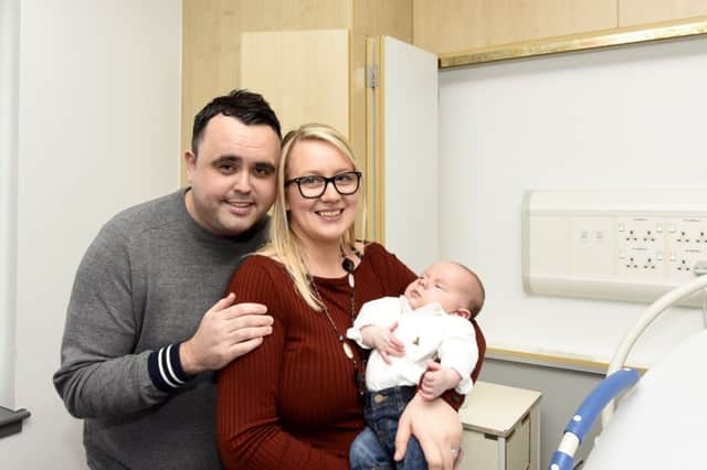 Jordan Clarke  with Laura and baby Logan  (Pic:-Fife Photo Agency)