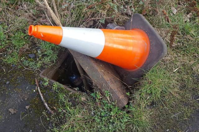 The manhole near West Bridge Mill in Kirkcaldy has now been fixed.