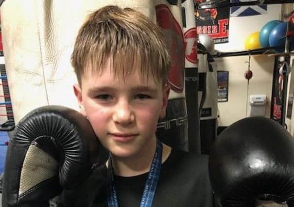 Glenrothes boxing club Michael Millar (13) wins Eastern District Championship at 38kgs category