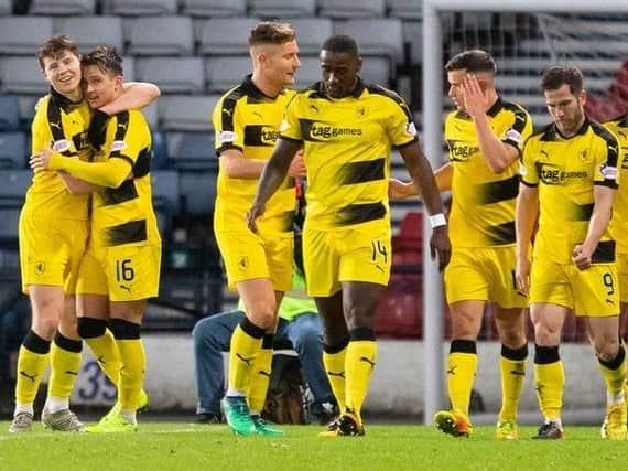 Raith Rovers players celebrate a goal against Queen's Park in a Scottish Cup win in November. Pic: Ian Cairns
