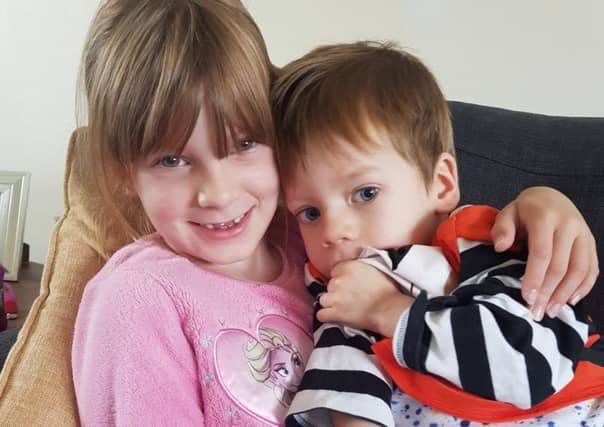 Aron and sister Ellie