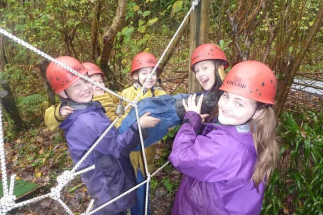 Strathallan Primary School pupils are all tied up while learning the power of team work at the outdoor education centre.