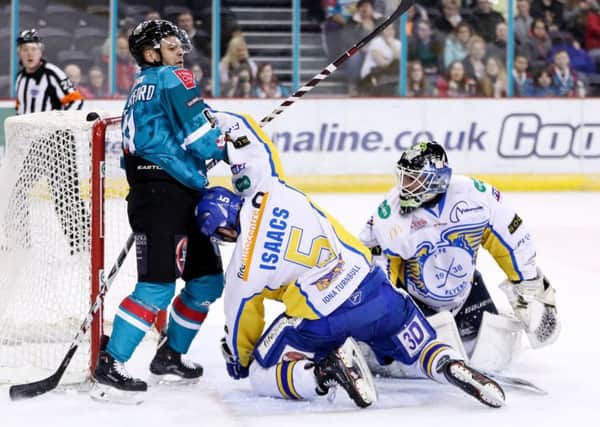David Rutherford, Belfast Giants, with Fife Flyers James Isaacs and Jordan Marr  (Pic:  William Cherry/Presseye

)