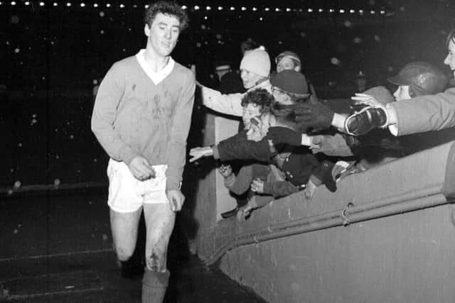 Rangers v Raith Rovers at Ibrox - Rangers player Jim Baxter leaves the field at the end of the game in 1962.