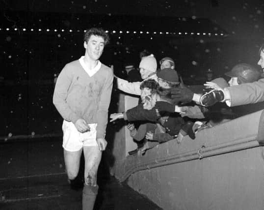 Rangers v Raith Rovers at Ibrox - Rangers player Jim Baxter leaves the field at the end of the game in 1962.
