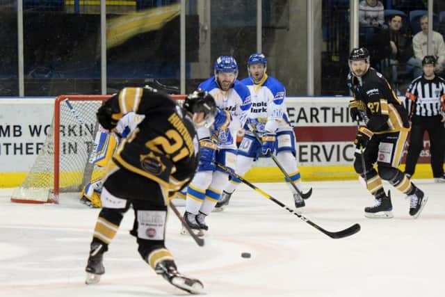 Carlo Finucci prepares to block a shot from Panthers' Mark Hurtubise. Pic: Nottingham Panthers