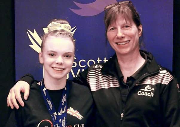 Kirkcaldy gymnast Emily Bremner (left) with coach Bea Petersen.