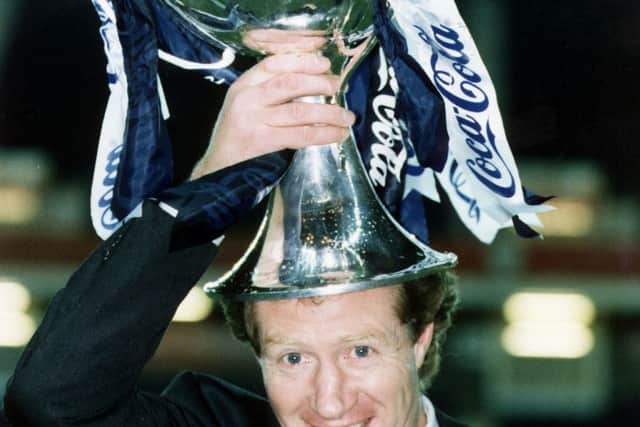 Raith Rovers manager Jimmy Nicholl celebrating his team winning the cup.