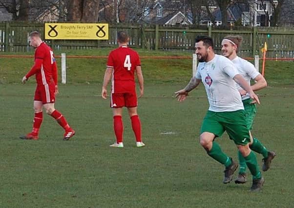 Thornton Hibs midfielder Chris Ireland celebrates 100th goal for the club as he opens the scoring in Hibs' 3-1 defeat to Broughty Athletic