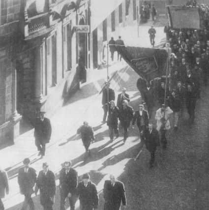 Miners' strike 1974 - miners march up Kirk Wynd,. Kirkcaldy on their way back to work at the end of the dispute (Pic: Fife Free Press)