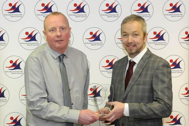 World champion stock car racer Gordon Moodie (right) receives his award from Paul Hossack of Fife Sport & Leisure Trust. Runners-up were international fencer Chloe Dickson and Commonwealth Games medallist, swimmer Mark Szaranek.