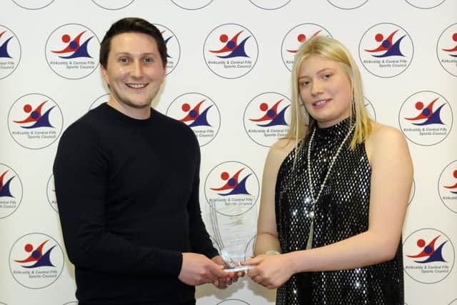 Levenmouth netball coach Francesca Caira receives her trophy from Senior Active Schools Co-ordinator Murray McBain. Runners-up were Beth McCrimmond (Glenrothes) and Sam Lacy (Glenrothes).