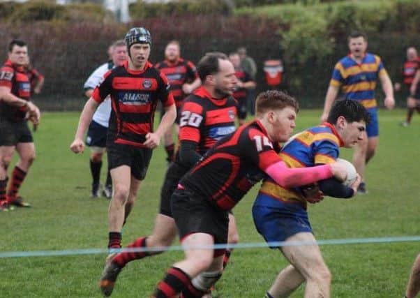 Waid winger Andrew Allen puts in a strong tackle in the victory over Crieff. Pic by Michael R Stockwell.