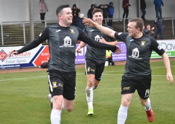 The Fife players celebrate after Anton Dowds' equaliser.