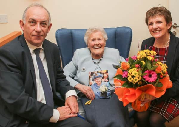 Mrs Betty Craig celebrated her 105th birthday on March 12. Councillor Judy Hamilton presented Mrs Craig with flowers on behalf of Fife Council, and Col Jim Kinloch DL represented the Lieutenancy. Pic: Andrew Beveridge/Fife Council.
