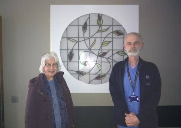 Iris and David with the window