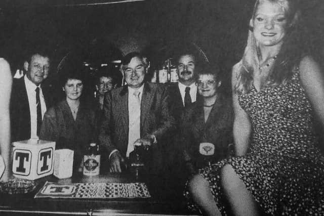 Proprietor Eddie Melville pulling the first pint in the Kirkcaldy pub.
