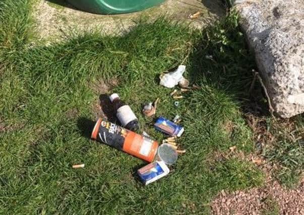 Rubbish, including medicine bottle and packets discarded next to bin at Pathhead Sands in Kirkcaldy. Pic by Eunice Cameron