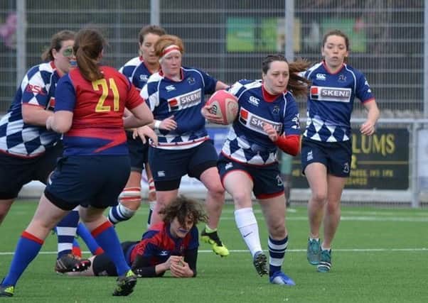 Claire Buist (fullback) on her way to score. Pic by Ian Cole.